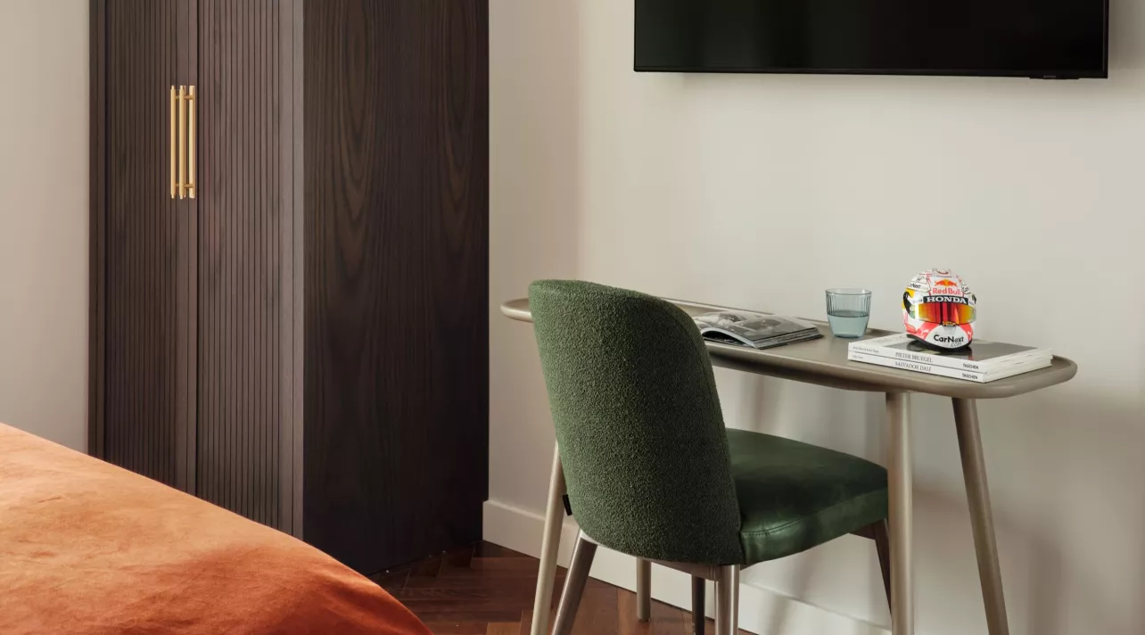 bedroom with desk for working from the residence